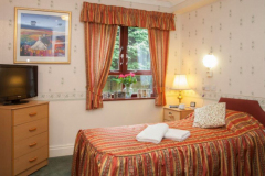 aarondale-care-home-bedroom-1024x651-1